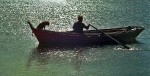 pescador y su perro. Laguna de Rocha. Ur.