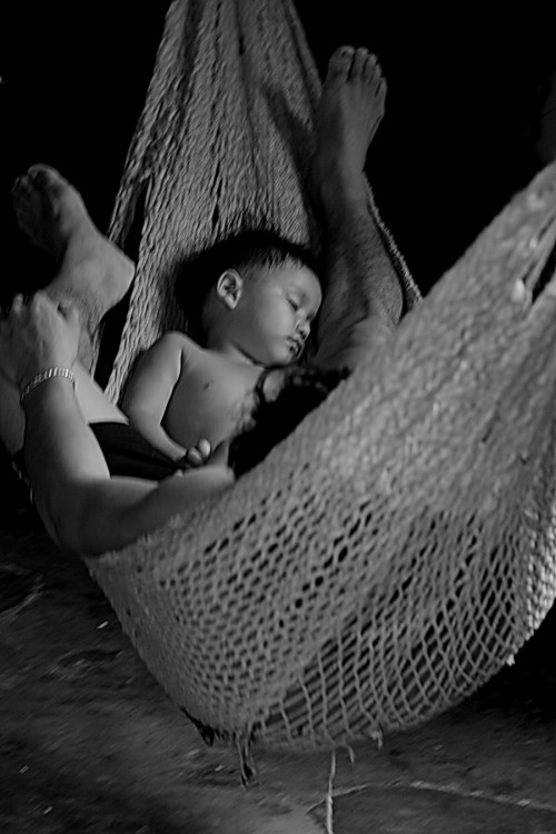 "Padre e hijo descansando....." de Rafael Buteler