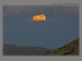 Sunrise moon cloud