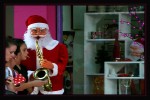 Ella con el Chupetn y Papa Noel Toca la Trompeta