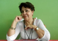 La mujer cubana: Ángel protector, flor y sostén